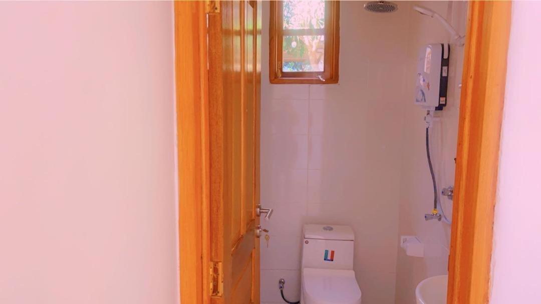 Evelina House Hostel Boma la Ngombe Bagian luar foto